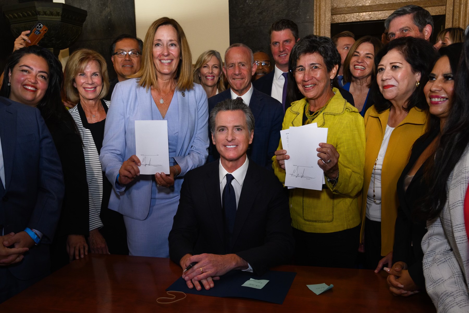 Governor Newsom with Assemblymember Irwin and Senator Eggman after signing AB 531 and SB 326