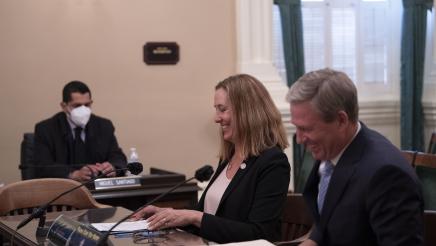 Asm. Irwin and DA Nasarenko sharing a light moment with the committee