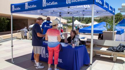 SoCalGas booth staffers sharing info with constituents