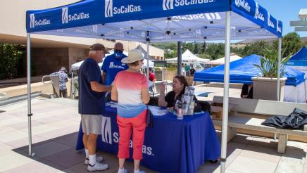 SoCalGas booth staffers sharing info with constituents
