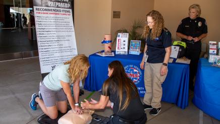Constituent receiving CPR instruction
