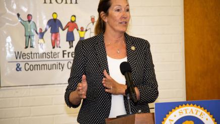 Asm. Irwin at podium, speaking