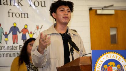Guest speaker at podium, speaking