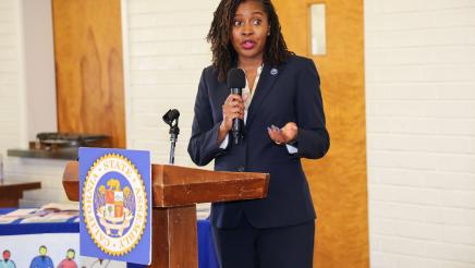 Guest speaker at podium, speaking