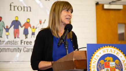 Guest speaker at podium, speaking
