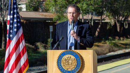 Guest speaker at podium, speaking