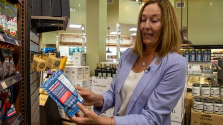 Asm. Irwin displaying food product