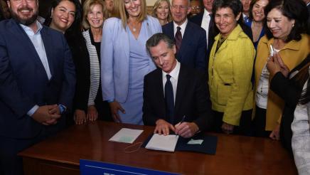 Governor Newsom signing AB 531 & SB 326 with authors Assmblymember Irwin & Senator Egmman