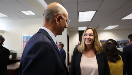 Assemblymember Irwin and attendee speak after Governor’s press conference on historic mental health reform 