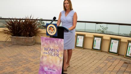 Asm. Irwin at podium, speaking