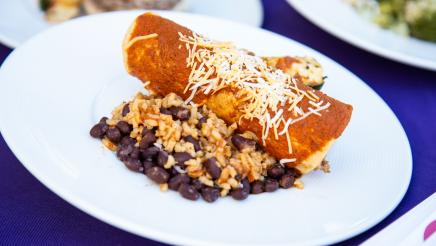 Plate with enchilada, rice and beans
