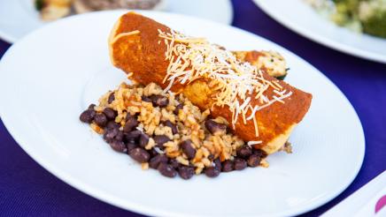 Plate with enchilada, rice and beans