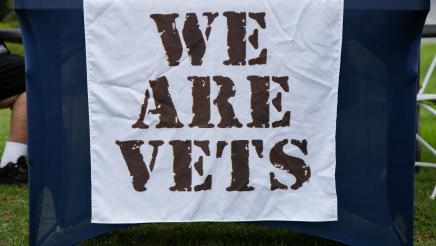"We Are Vets" table sign
