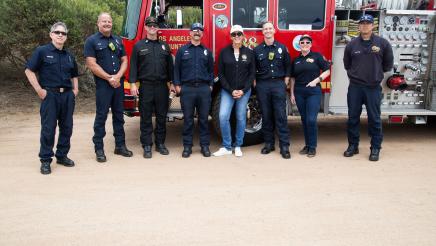 Group photo of Asm. Irwin with firefighters