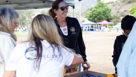 Asm. Irwin speaking Malibu C.A.R.T. table staffers