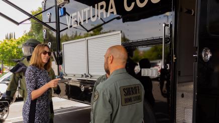 Asm. Irwin speaks with bomb squad