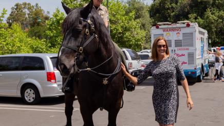 Asm. Irwin with officer on horseback