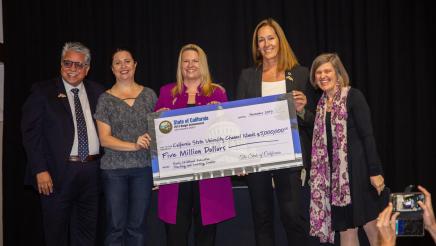 Asm. Irwin presenting check